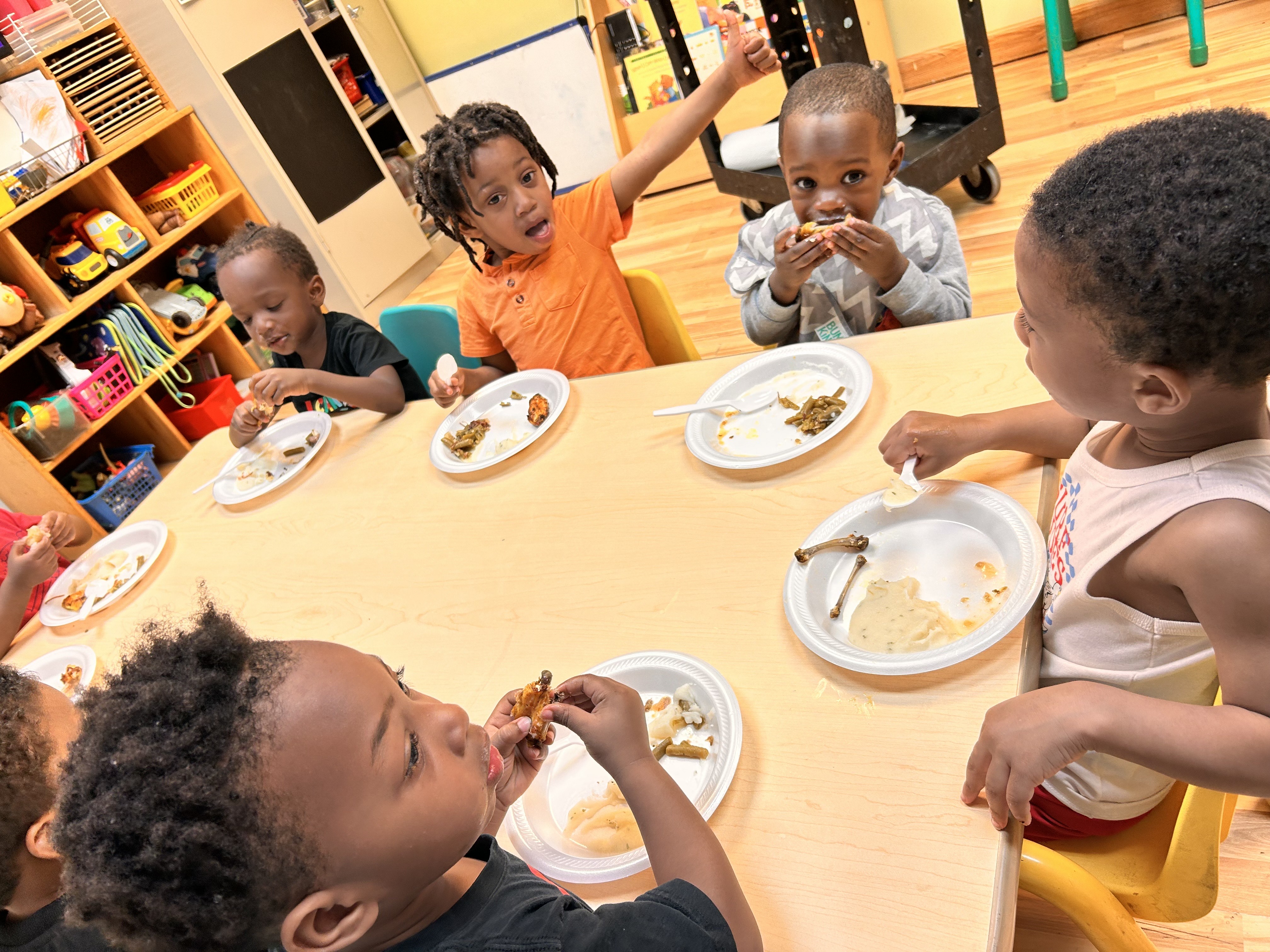 Children enjoying healthy lunch